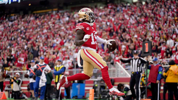 Dec 10, 2023; Santa Clara, California, USA; San Francisco 49ers wide receiver Deebo Samuel (19) runs for a touchdown against the Seattle Seahawks in the third quarter at Levi's Stadium. Mandatory Credit: Cary Edmondson-USA TODAY Sports  