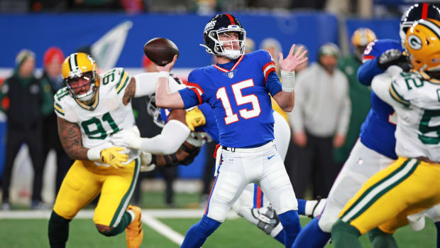 Dec 11, 2023; East Rutherford, New Jersey, USA; New York Giants quarterback Tommy DeVito (15) throws a pass during the first quarter against the Green Bay Packers at MetLife Stadium.