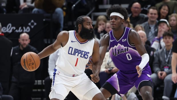 Los Angeles Clippers guard James Harden (1) moves the ball against Utah Jazz forward Taylor Hendricks (0) during the second quarter at Delta Center.