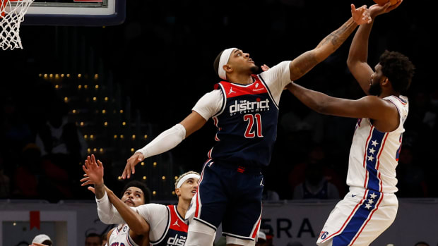 Dec 6, 2023; Washington, District of Columbia, USA; Philadelphia 76ers center Joel Embiid (21) shoots the ball over Washington Wizards center Daniel Gafford (21) in the fourth quarter at Capital One Arena. Mandatory Credit: Geoff Burke-USA TODAY Sports