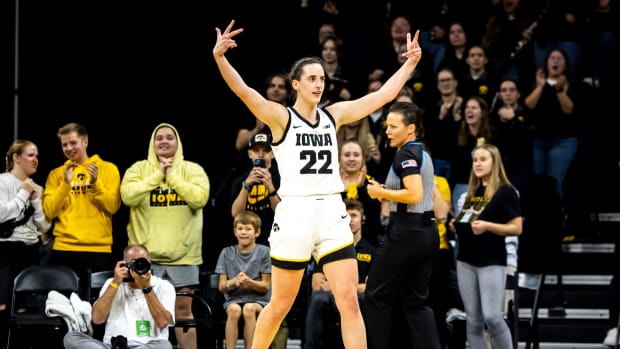 Iowa guard Caitlin Clark (22) reacts after making a 3-point basket during a NCAA women's basketball game against Drake, Sunday, Nov. 19, 2023, at Carver-Hawkeye Arena in Iowa City, Iowa.