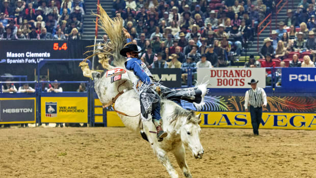 Mason Clements rides his horse during the Bareback Riding event at the NFR