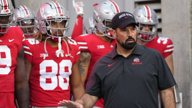 Sep 17, 2022; Columbus, Ohio, USA; Ohio State Buckeyes head coach Ryan Day leads his team onto the field prior to the NCAA Division I football game against the Toledo Rockets at Ohio Stadium.