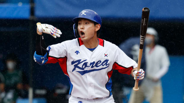 Aug 7, 2021; Yokohama, Japan; Team South Korea outfielder Jung Hoo Lee (51) gestures after a wild pitch by Dominican Republic in the baseball bronze medal match during the Tokyo 2020 Olympic Summer Games at Yokohama Baseball Stadium.