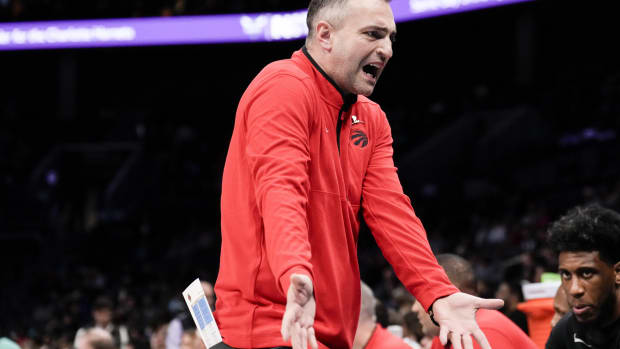 Dec 8, 2023; Charlotte, North Carolina, USA; Toronto Raptors head coach Darko Rajakovic reacts to a call during the first quarter against the Charlotte Hornets at the Spectrum Center. Mandatory Credit: Jim Dedmon-USA TODAY Sports
