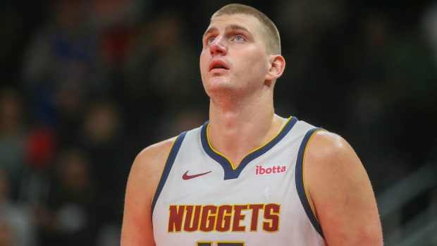 Nikola Jokic looks up during a game against the Hawks.