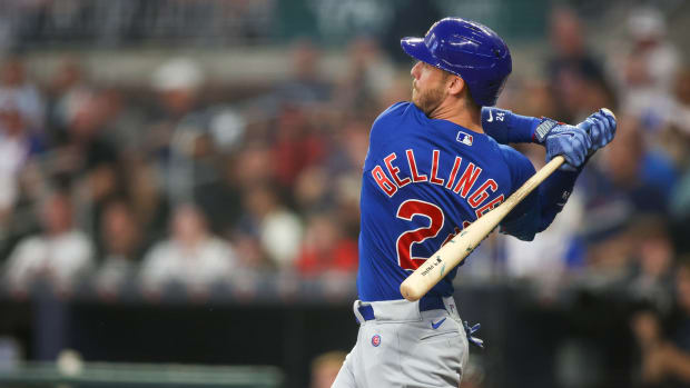 Sep 26, 2023; Atlanta, Georgia, USA; Chicago Cubs first baseman Cody Bellinger (24) hits a single against the Atlanta Braves in the second inning at Truist Park.