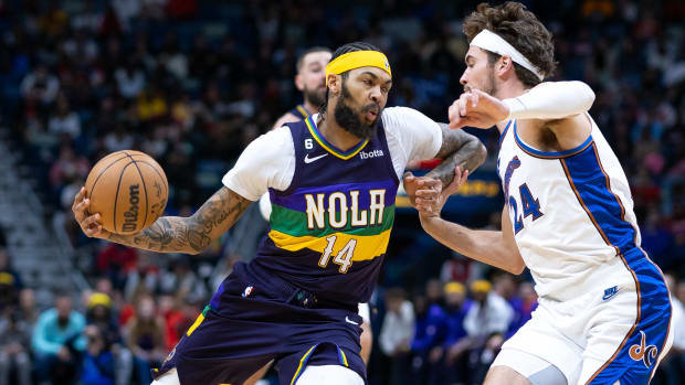  Jan 28, 2023 New Orleans, Louisiana, USA  New Orleans Pelicans forward Brandon Ingram (14) dribbles against Washington Wizards forward Corey Kispert (24) during the first half at Smoothie King Center. Mandatory Credit Stephen Lew USA TODAY Sports
