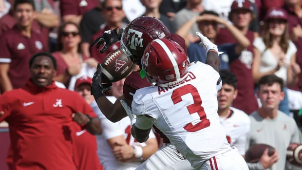 Oct 7, 2023; College Station, Texas, USA; Texas A&M Aggies wide receiver Moose Muhammad III (7) attempts to make a reception as Alabama Crimson Tide defensive back Terrion Arnold (3) /defends during the second quarter at Kyle Field.