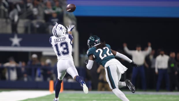 Dallas Cowboys wide receiver Michael Gallup (13) catches a pass against Philadelphia Eagles cornerback Kelee Ringo (22) in the fourth quarter at AT&T Stadium.