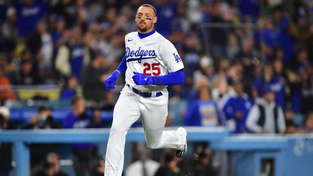 Apr 17, 2023; Los Angeles, California, USA; Los Angeles Dodgers center fielder Trayce Thompson (25) runs home to scored against the New York Mets during the second inning at Dodger Stadium.