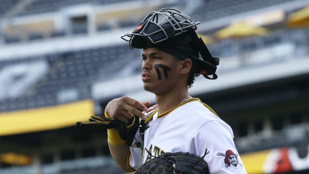 Sep 4, 2023; Pittsburgh, Pennsylvania, USA; Pittsburgh Pirates catcher Endy Rodriguez (25) heads to the bullpen to warm up before the game against the Milwaukee Brewers at PNC Park.