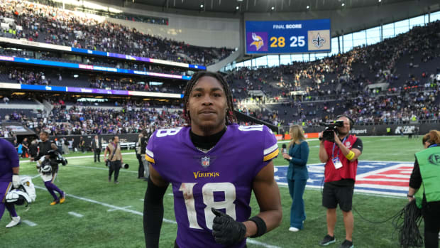 Oct 2, 2022; London, United Kingdom; Minnesota Vikings wide receiver Justin Jefferson (18) celebrates at the end of the game against the New Orleans Saints during an NFL International Series game at Tottenham Hotspur Stadium. The Vikings defeated the Saints 28-25.