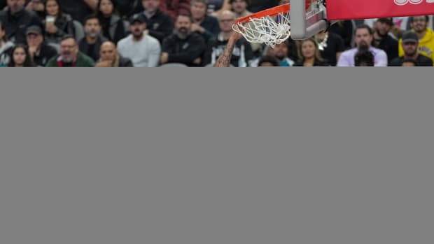Dec 13, 2023; San Antonio, Texas, USA; Los Angeles Lakers forward Anthony Davis (3) dunks in front of San Antonio Spurs center Victor Wembanyama (1) and forward Keldon Johnson (3) in the first half at the Frost Bank Center.
