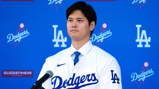 Shohei Ohtani speaks at an introductory press conference at Dodger Stadium.