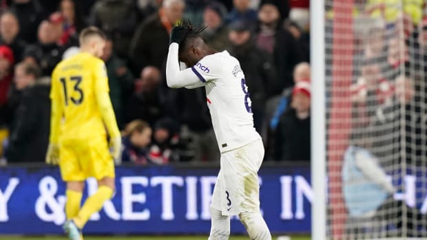 Tottenham Hotspur midfielder Yves Bissouma pictured with his head in his hands after being sent off during a Premier League game against Nottingham Forest in December 2023