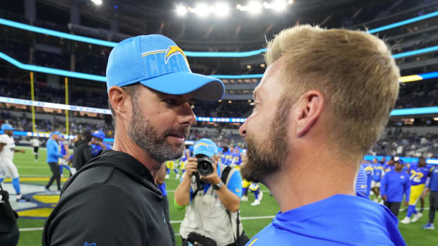 Los Angeles Chargers coach Brandon Staley (left) talks with Los Angeles Rams coach Sean McVay after the game at SoFi Stadium.