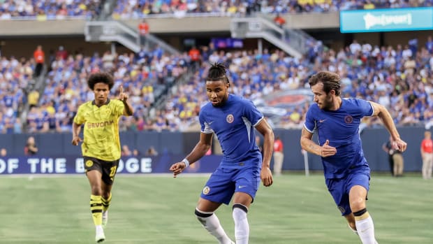 Christopher Nkunku pictured (center) playing for Chelsea in a pre-season friendly against Borussia Dortmund in August 2023