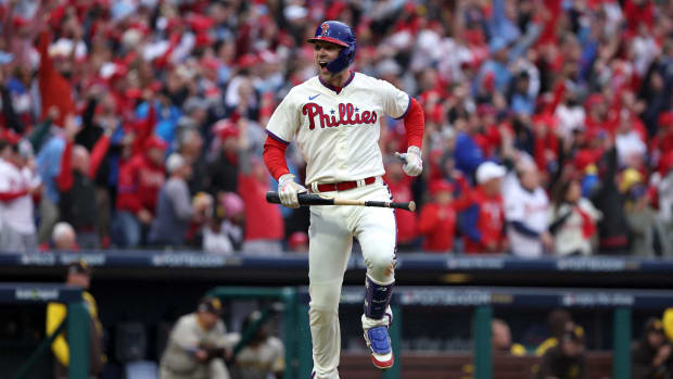Oct 23, 2022; Philadelphia, Pennsylvania, USA; Philadelphia Phillies first baseman Rhys Hoskins (17) reacts after hitting a two-run home run in the third inning during game five of the NLCS against the San Diego Padres for the 2022 MLB Playoffs at Citizens Bank Park.