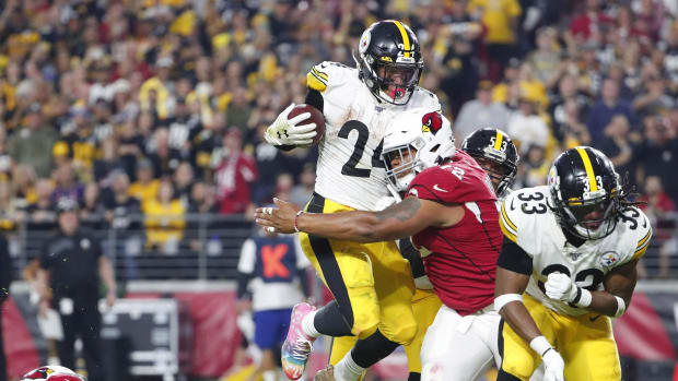 Pittsburgh Steelers running back Benny Snell (24) is tackled by Arizona Cardinals nose tackle Miles Brown (72) during the third quarter at State Farm Stadium December 8, 2019. Steelers Vs Cardinals  