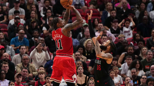Chicago Bulls forward DeMar DeRozan (11) shoots over Miami Heat forward Caleb Martin (16) during the second half at Kaseya Center.