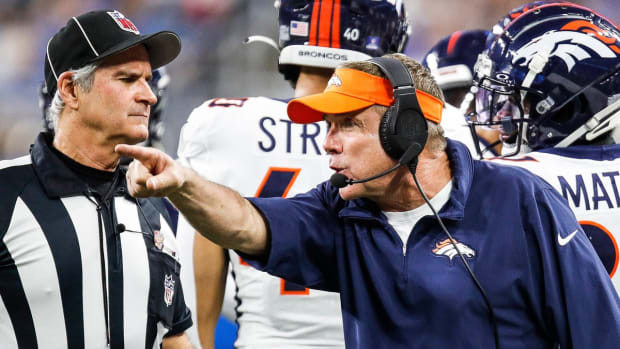Denver Broncos head coach Sean Payton talks to a referee during the second half against the Detroit Lions at Ford Field in Detroit on Saturday, Dec. 16, 2023.
