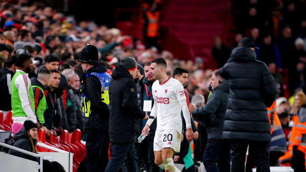 Manchester United defender Diogo Dalot pictured (center) moments after being sent off during a 0-0 draw with Liverpool at Anfield in December 2023