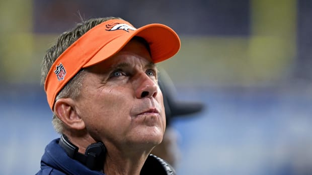 Denver Broncos head coach Sean Payton looks at the scoreboard in the fourth quarter against the Detroit Lions at Ford Field.