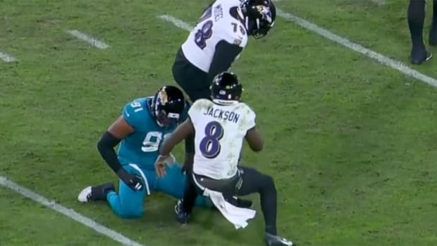 Baltimore Ravens quarterback Lamar Jackson after avoiding a sack from Jaguars OLB Dawuane Smoot