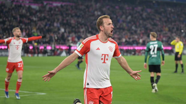 Harry Kane pictured celebrating after scoring the 20th goal of his Bundesliga career for Bayern Munich in a 3-0 win over Stuttgart in December 2023
