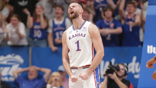 Kansas senior center Hunter Dickinson (1) reacts after sinking a three in the first half of Monday's game against North Carolina Central inside Allen Fieldhouse.