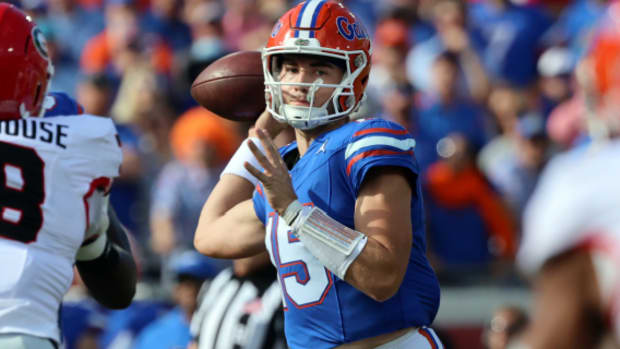 Florida Gators quarterback Graham Mertz attempts a pass during a college football game in the SEC.