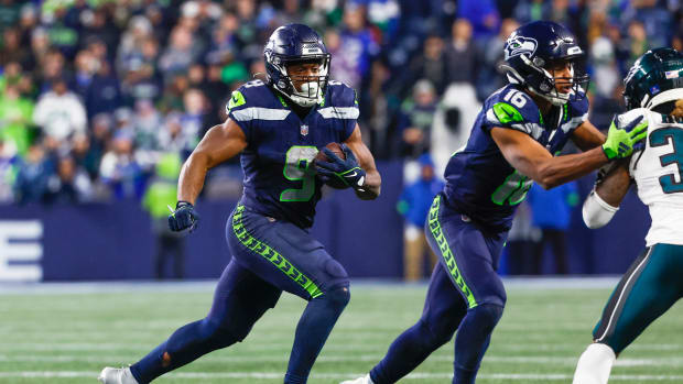 Dec 18, 2023; Seattle, Washington, USA; Seattle Seahawks running back Kenneth Walker III (9) rushes against the Philadelphia Eagles during the fourth quarter at Lumen Field.