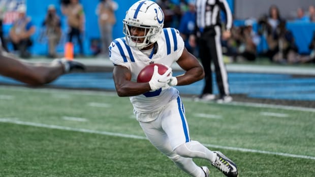 Nov 5, 2023; Charlotte, North Carolina, USA; Indianapolis Colts wide receiver Isaiah McKenzie (6) returns the kick off during the first quarter against the Carolina Panthers at Bank of America Stadium.