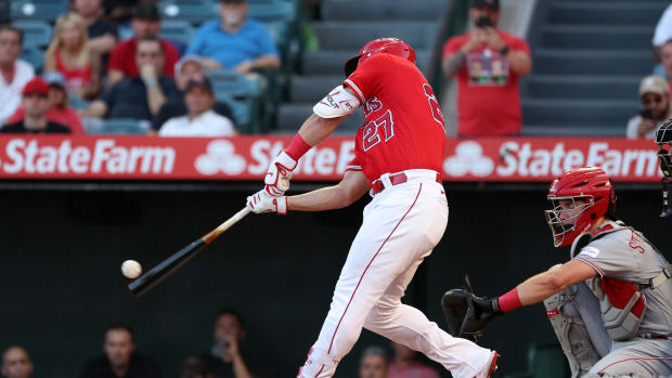 Aug 22, 2023; Anaheim, California, USA; Los Angeles Angels center fielder Mike Trout (27) pops out to second during the first inning against the Cincinnati Reds at Angel Stadium. Mandatory Credit: Kiyoshi Mio-USA TODAY Sports