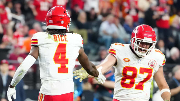 Nov 26, 2023; Paradise, Nevada, USA; Kansas City Chiefs wide receiver Rashee Rice (4) celebrates with Kansas City Chiefs tight end Travis Kelce (87) after scoring a touchdown against the Las Vegas Raiders during the fourth quarter at Allegiant Stadium. Mandatory Credit: Stephen R. Sylvanie-USA TODAY Sports  