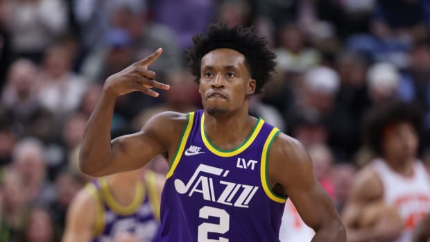 Utah Jazz guard Collin Sexton (2) reacts to making a three point shot against the New York Knicks during the second quarter at Delta Center.