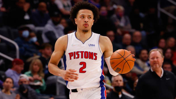 Detroit Pistons point guard Cade Cunningham dribbles the ball during a game.