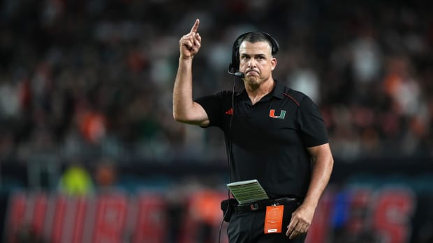 Miami Hurricanes head coach Mario Cristobal gestures in the second half against the Georgia Tech Yellow Jackets at Hard Rock Stadium.