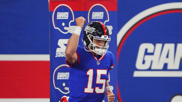 Dec 11, 2023; East Rutherford, New Jersey, USA; New York Giants quarterback Tommy DeVito (15) reacts before the game against the Green Bay Packers at MetLife Stadium.