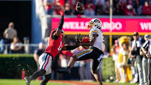 Nov 4, 2023; Athens, Georgia, USA; Georgia Bulldogs defensive back Julian Humphrey (12) is called for pass interference while covering Missouri Tigers wide receiver Luther Burden III (3) during the first half at Sanford Stadium. Mandatory Credit: Dale Zanine-USA TODAY Sports