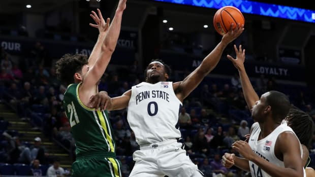Penn State's Kanye Clary drives to the basket against Le Moyne in a men's college basketball game at the Bryce Jordan Center.