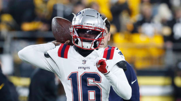 Dec 7, 2023; Pittsburgh, Pennsylvania, USA; New England Patriots quarterback Malik Cunningham (16) warms up before the game against the Pittsburgh Steelers at Acrisure Stadium.