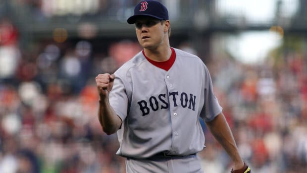 Former Red Sox closer Jonathan Papelbon pumps his fist after finishing a game.