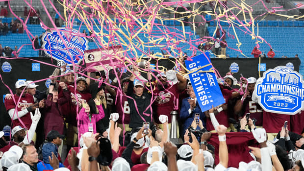 Florida State football celebrates the ACC championship after a win against Louisville.