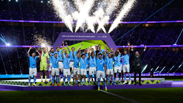 Kyle Walker pictured (front) lifting the FIFA Club World Cup trophy after Manchester City beat Fluminense 4-0 in the 2023 final
