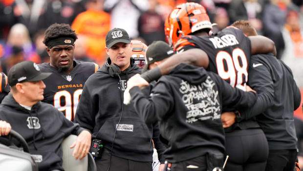 Cincinnati Bengals head coach Zac Taylor observes as Cincinnati Bengals defensive tackle DJ Reader (98) is helped to the cart after suffering an injury in the first quarter of a Week 15 NFL football game between the Minnesota Vikings and the Cincinnati Bengals, Saturday, Dec. 16, 2023, at Paycor Stadium in Cincinnati.  