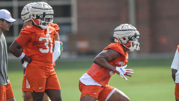 Clemson linebacker Kobe McCloud (31) watches as linebacker TJ Dudley (26) runs in a drill during the first day of fall football practice at the Allen Reeves Complex in Clemson Friday, August 5, 2022. Clemson Football First Day Fall Practice 