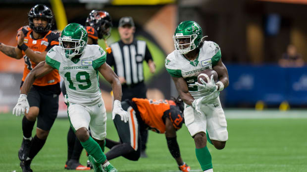 Aug 26, 2022; Vancouver, British Columbia, CAN; Saskatchewan Roughriders wide receiver Samuel Emilus (19) and running back Frankie Hickson (20) run upfield against the BC Lions in the second half at BC Place. Mandatory Credit: Bob Frid-USA TODAY Sports