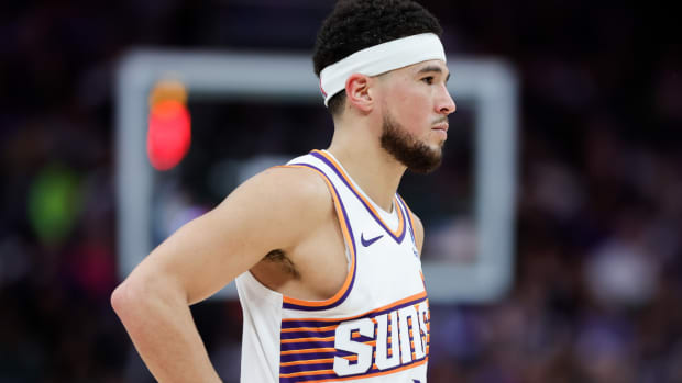 Phoenix Suns guard Devin Booker (1) looks on during the fourth quarter against the Sacramento Kings at Golden 1 Center.
